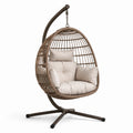 Sedia sospesa in rattan con cuscini beige